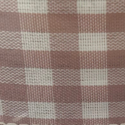 Roll of checkered ribbon with a clear plastic cover on a white background