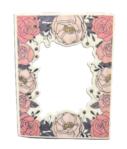 Letter 'L' shaped card with floral design on a white background
