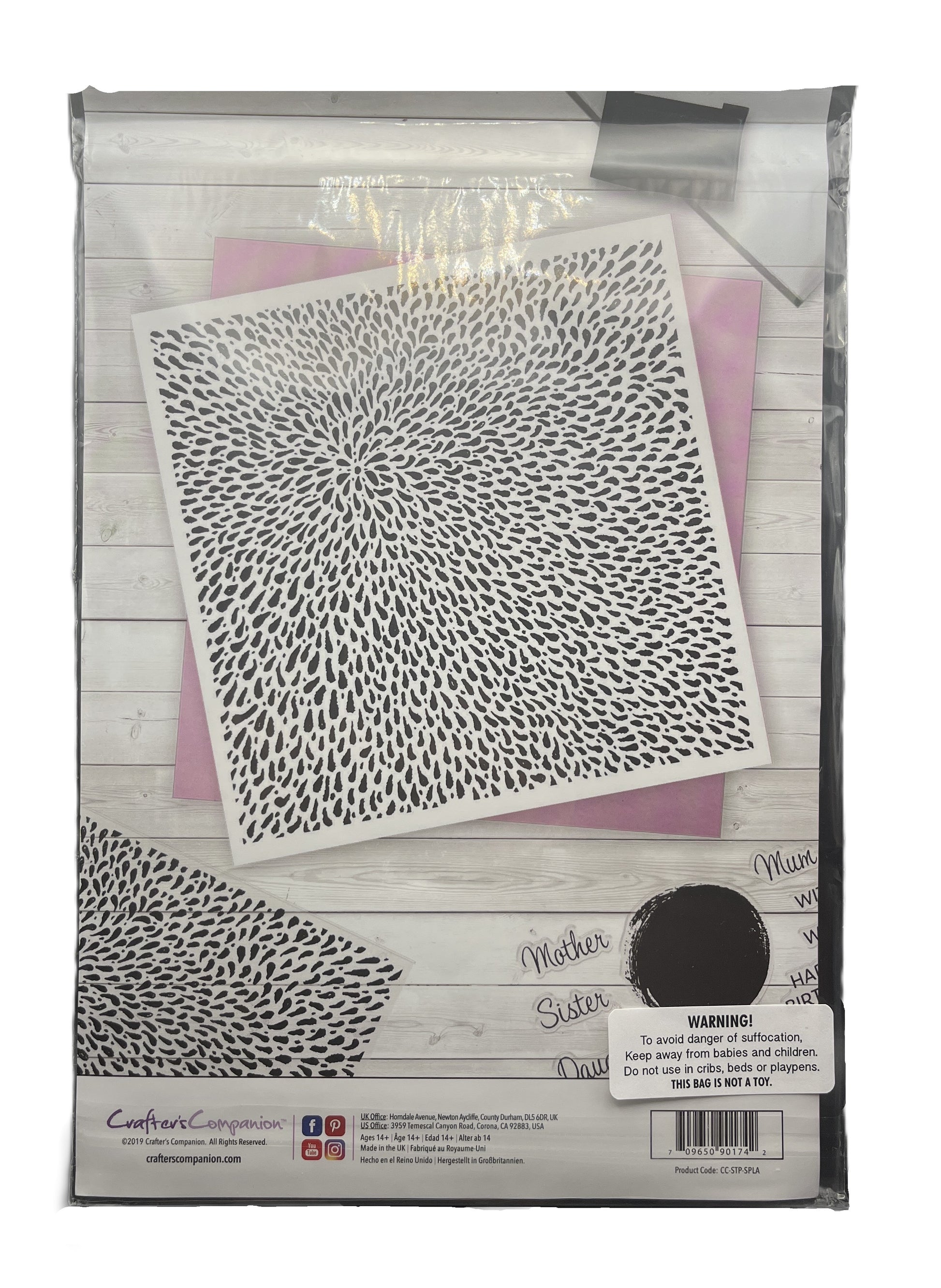 Packaged stencil with a geometric pattern on a wooden surface