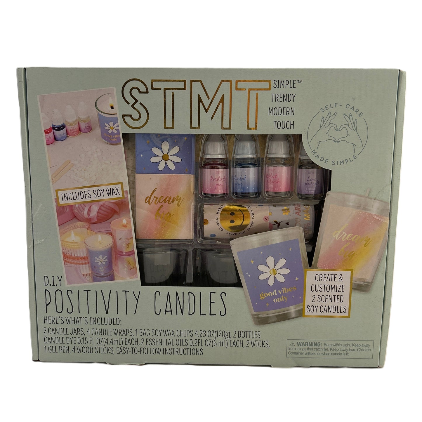Box of DIY Positivity Candles kit with various items on a white background