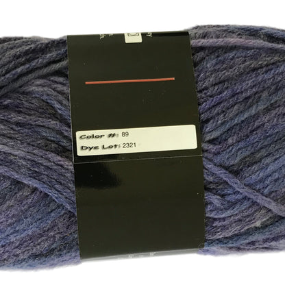 Blue skein of yarn with a label on a white background