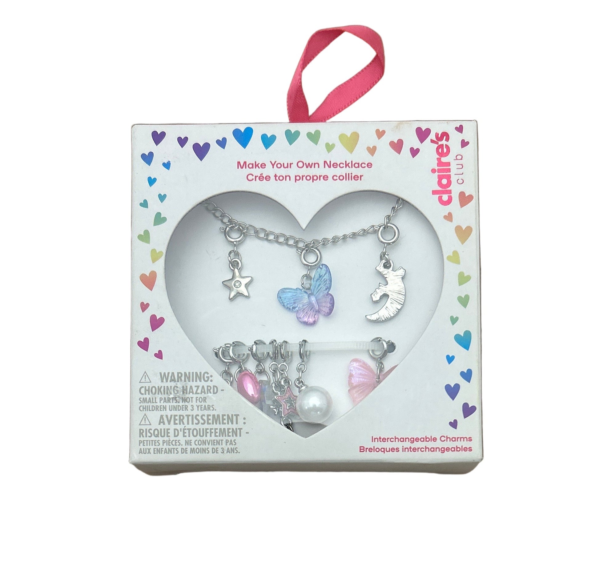 Delaire's Club necklace kit with charms in a heart-shaped box on a white background