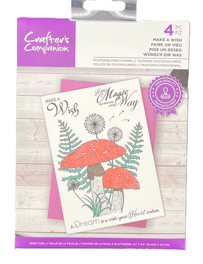 Packaged photo polymer stamps with mushroom design and 'Make a Wish' text, brand 'Crafters Companion' visible.
