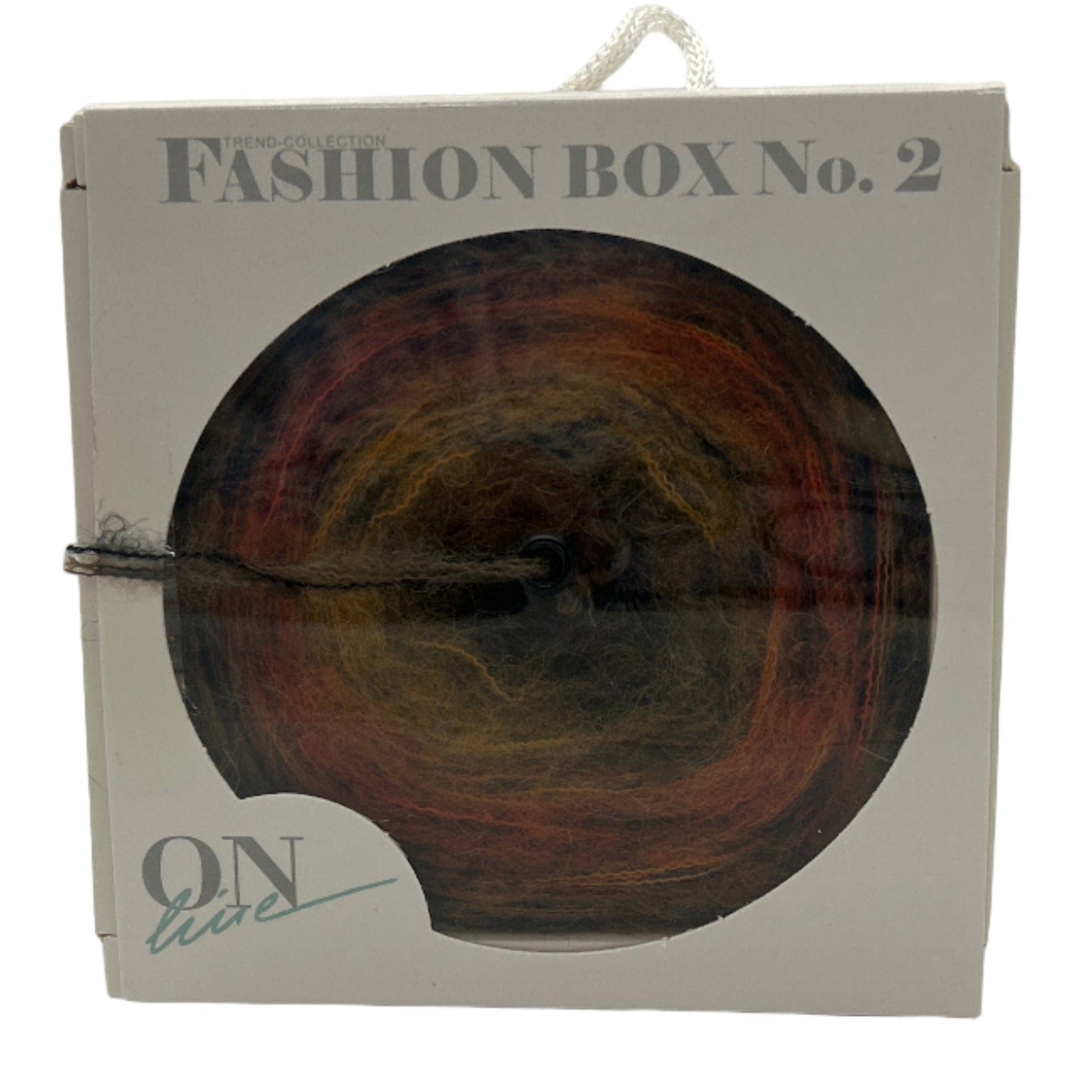 Packaged fashion item with 'Fashion Box No. 2' text on a white background