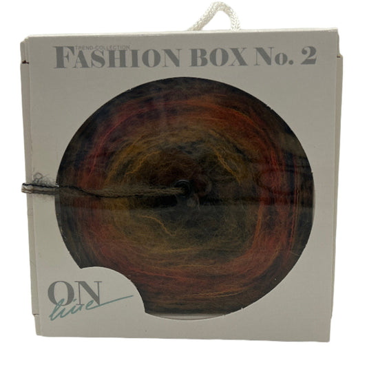 Packaged fashion item with 'Fashion Box No. 2' text on a white background