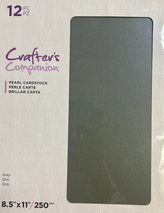 Package of Crafter's Companion cardstock on a wooden surface