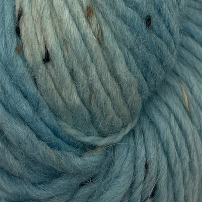 Close-up of blue yarn with visible fibers