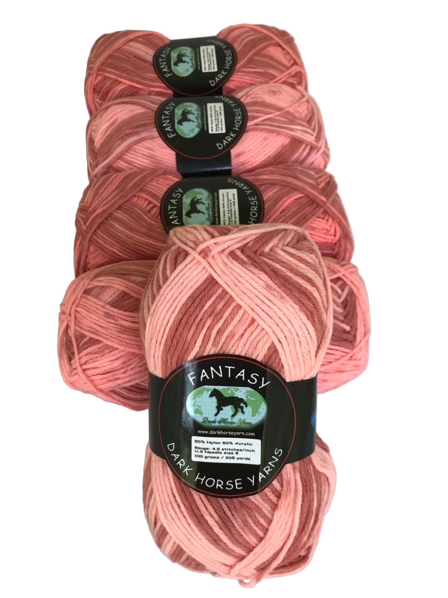 Pink yarn skeins with labels on a white background