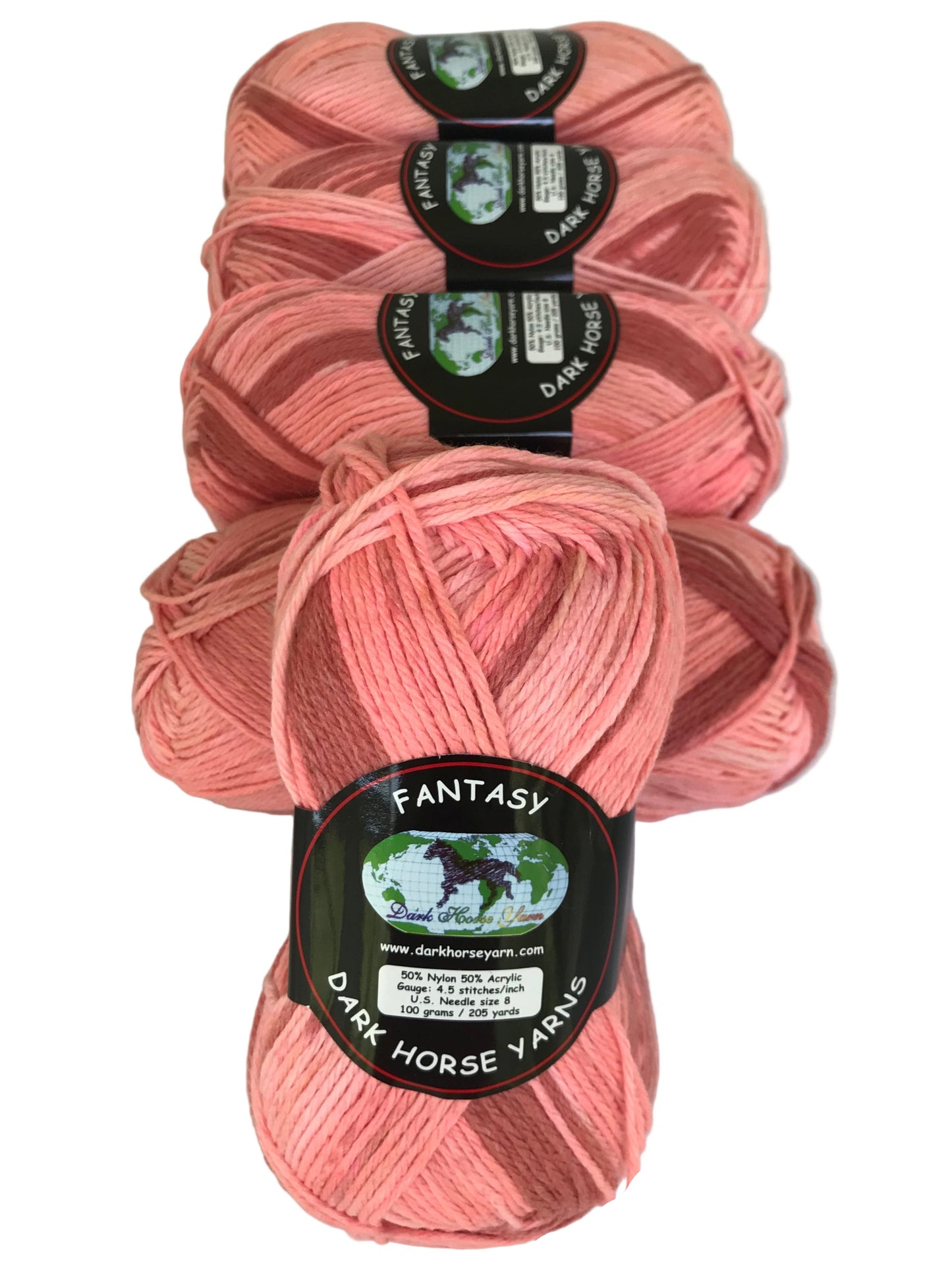 Pink yarn skeins with 'Fantasy' label on a white background