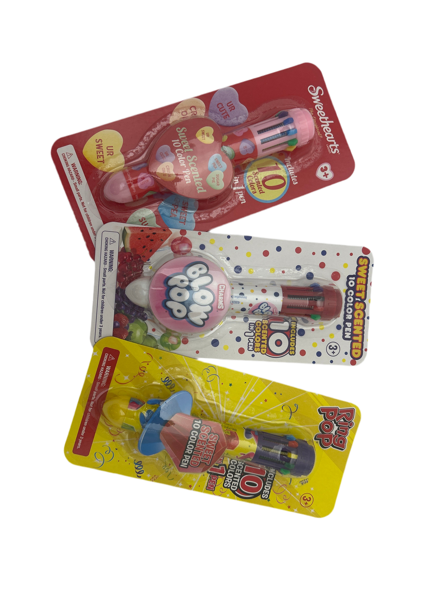 Three colorful packages of Pop It fidget toys on a white background