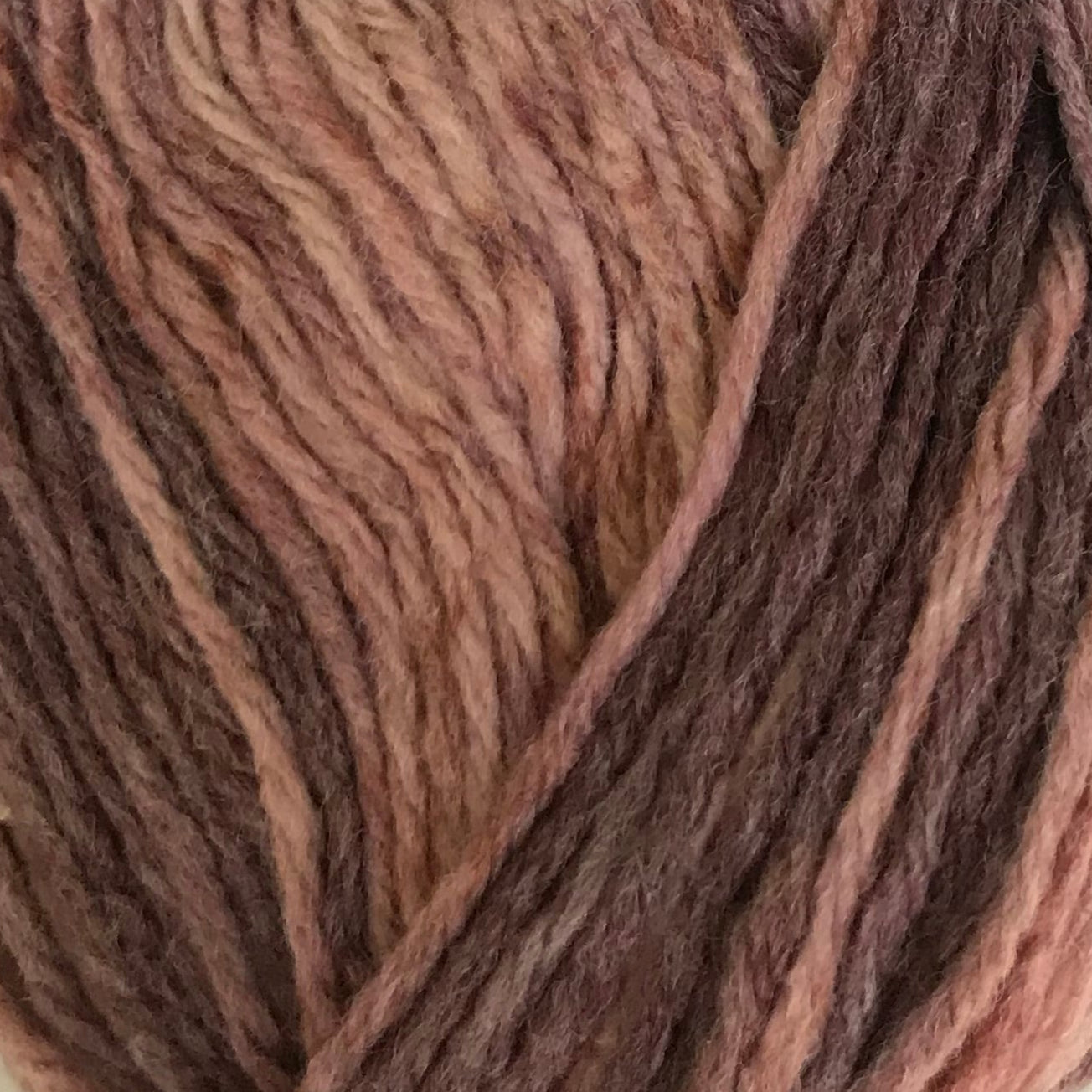 Ball of yarn with a label on a light background