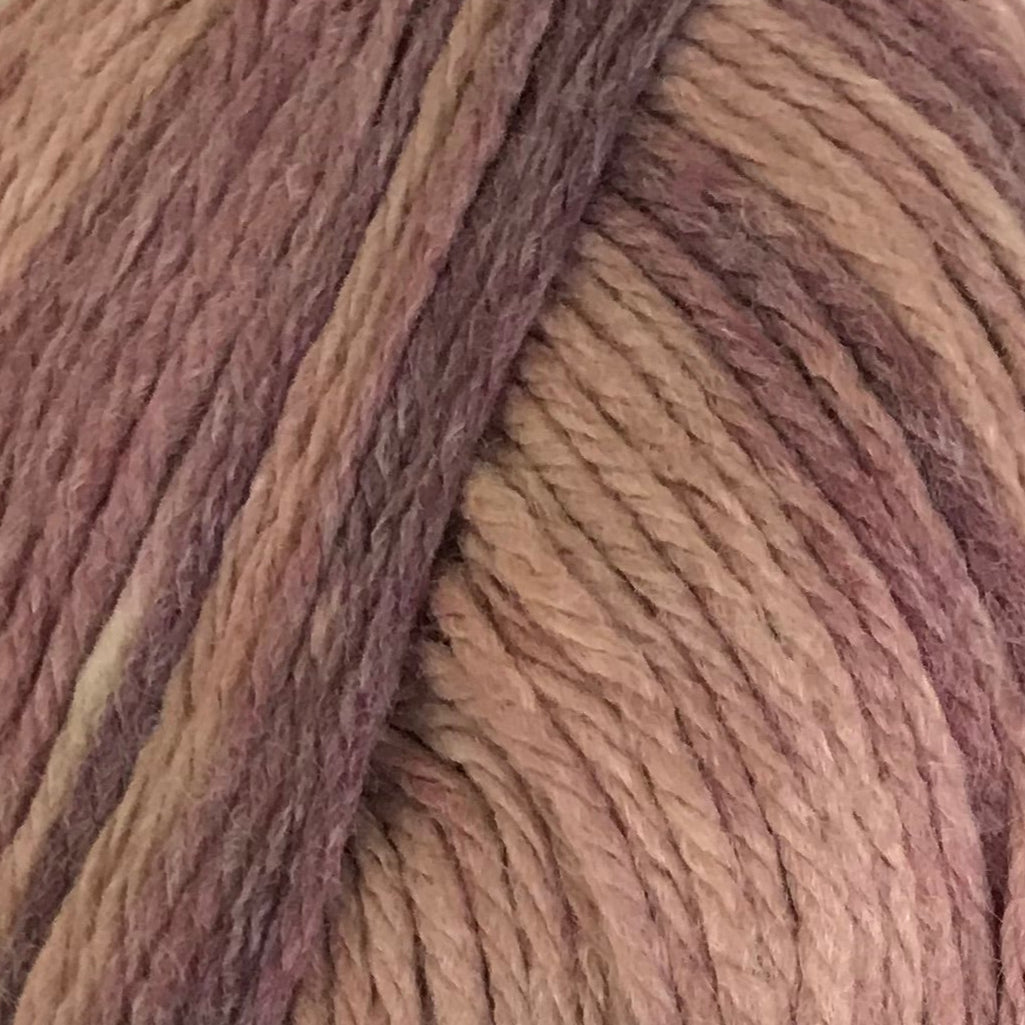 Close-up of a ball of yarn with brown and beige colors