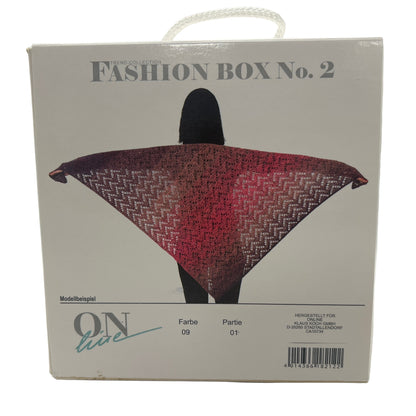 Fashion box with a patterned fabric item on a white background