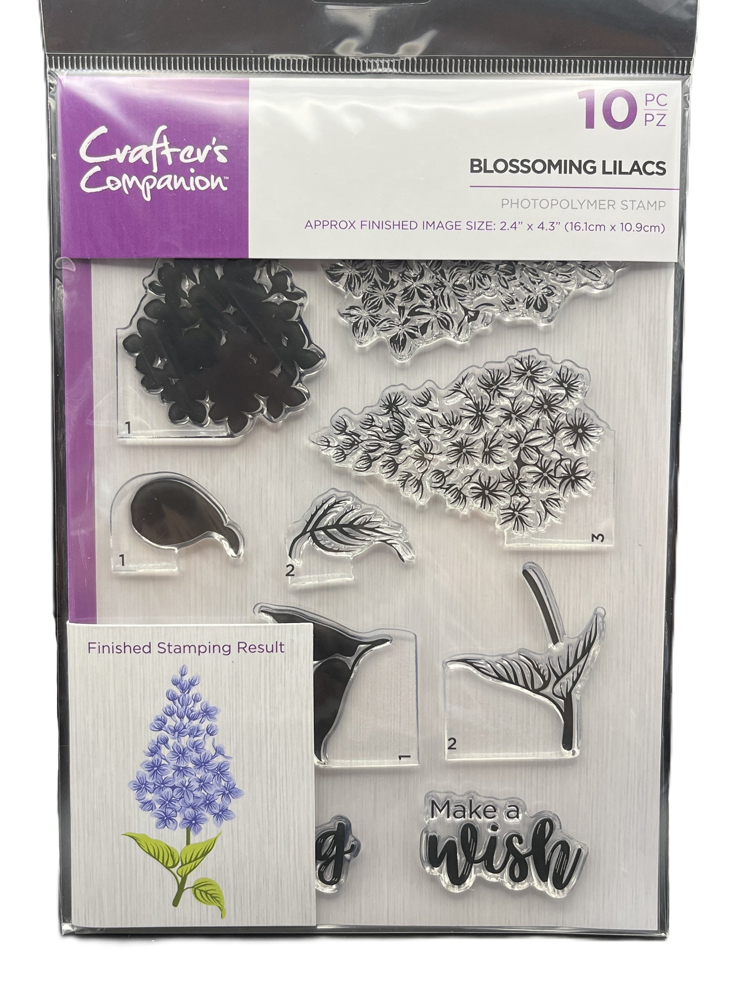 Packaged set of clear stamps with floral designs and text, featuring 'Crafters Companion' branding.