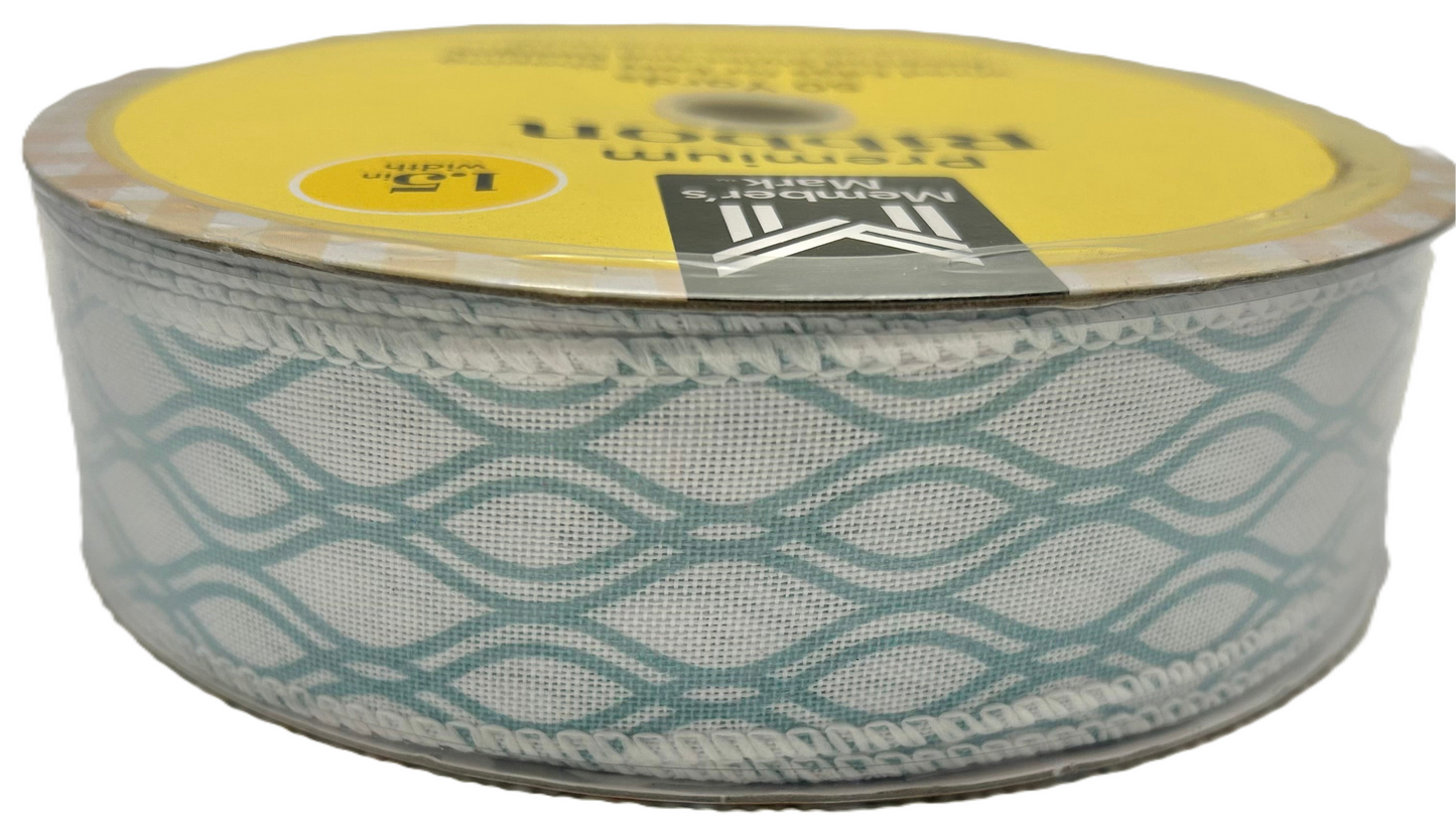 Air filter in a cylindrical container with a yellow lid and brand label.