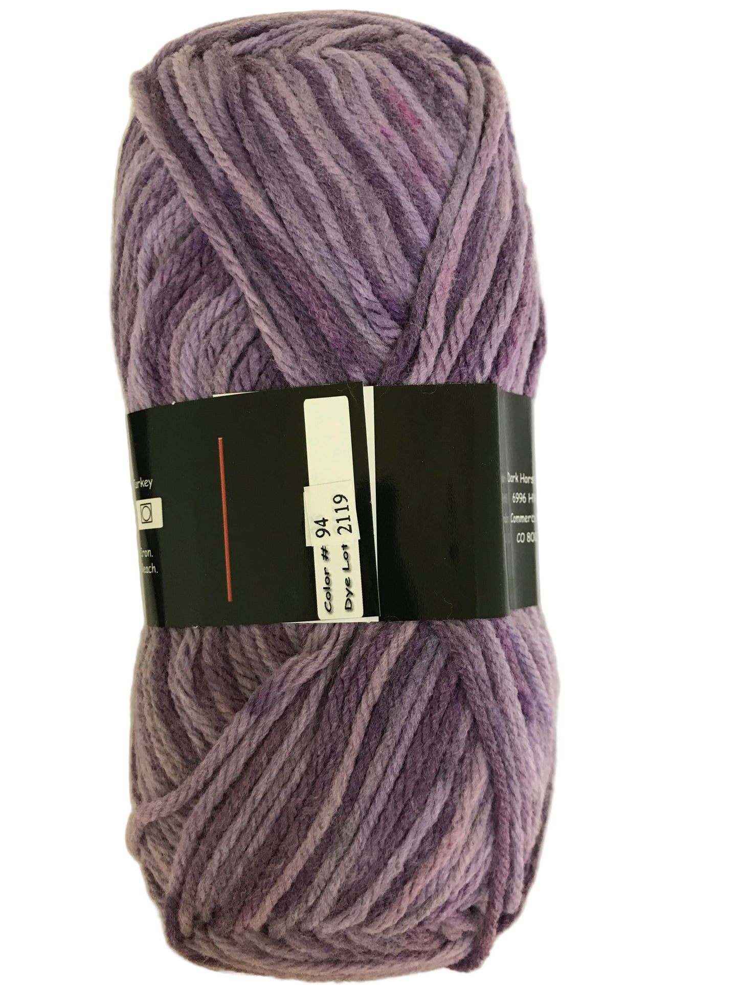 Ball of purple yarn with a label on a white background