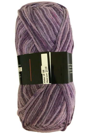 Ball of purple yarn with a label on a white background