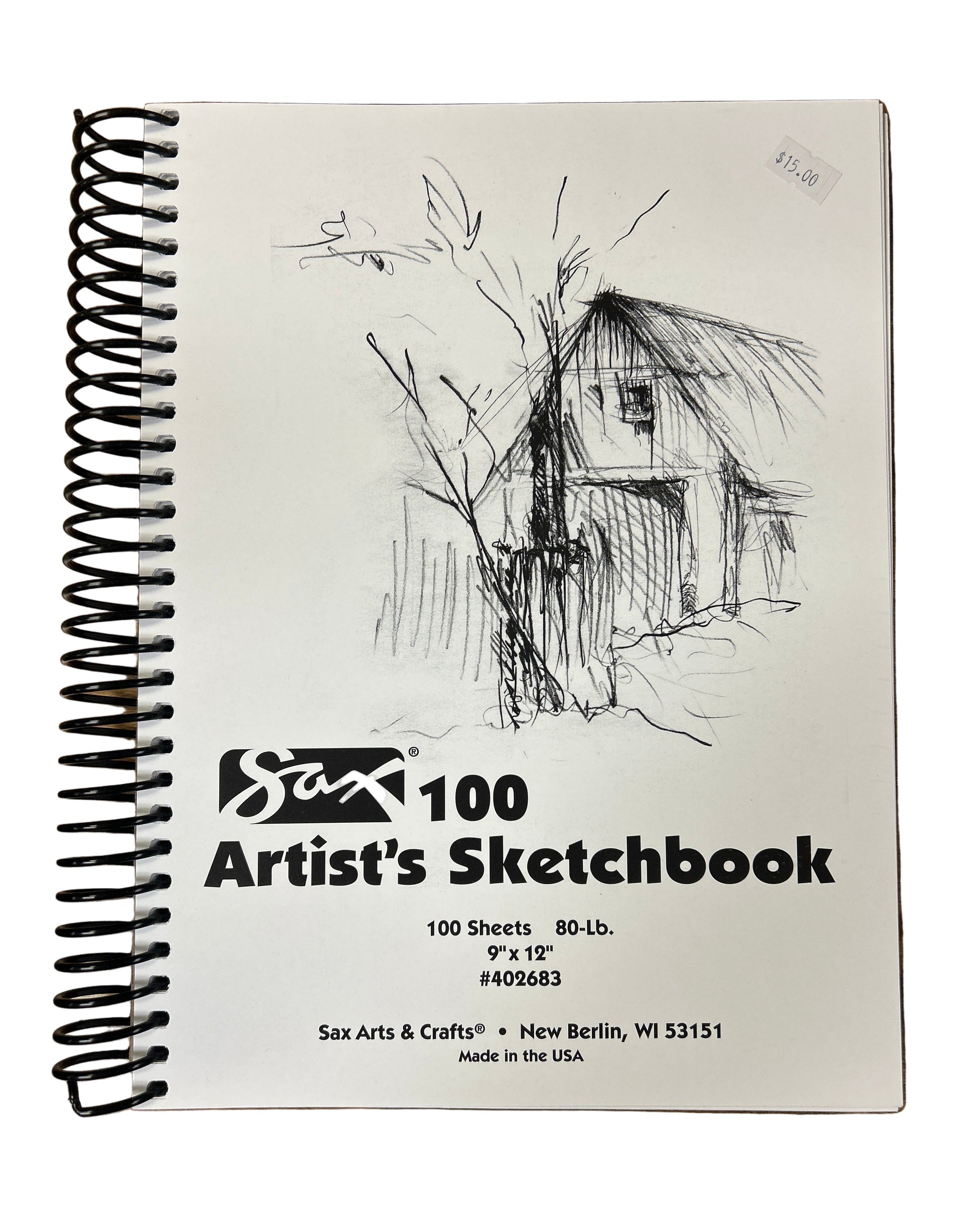Sax Artist's Sketchbook with a black and white drawing of a barn on the cover