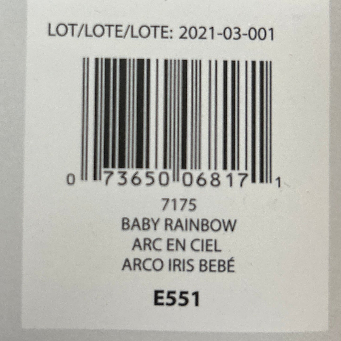 Product label with barcode and text on a wooden surface