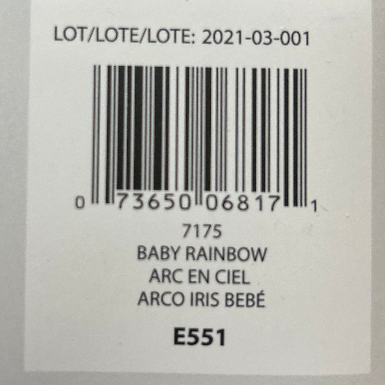 Product label with barcode and text on a wooden surface