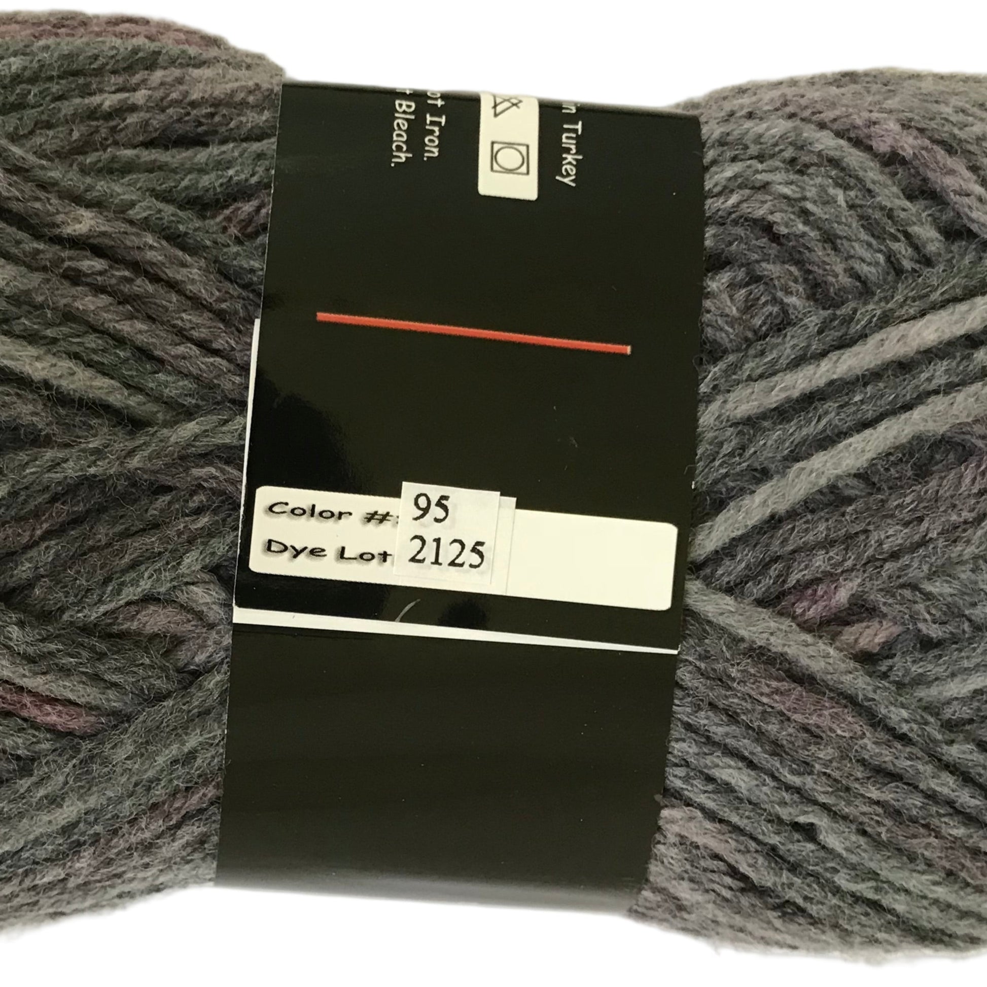 Gray skein of yarn with a label on a white background