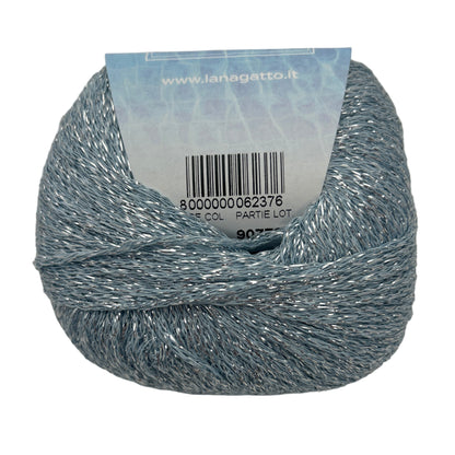 Ball of yarn with a label on a light gray background