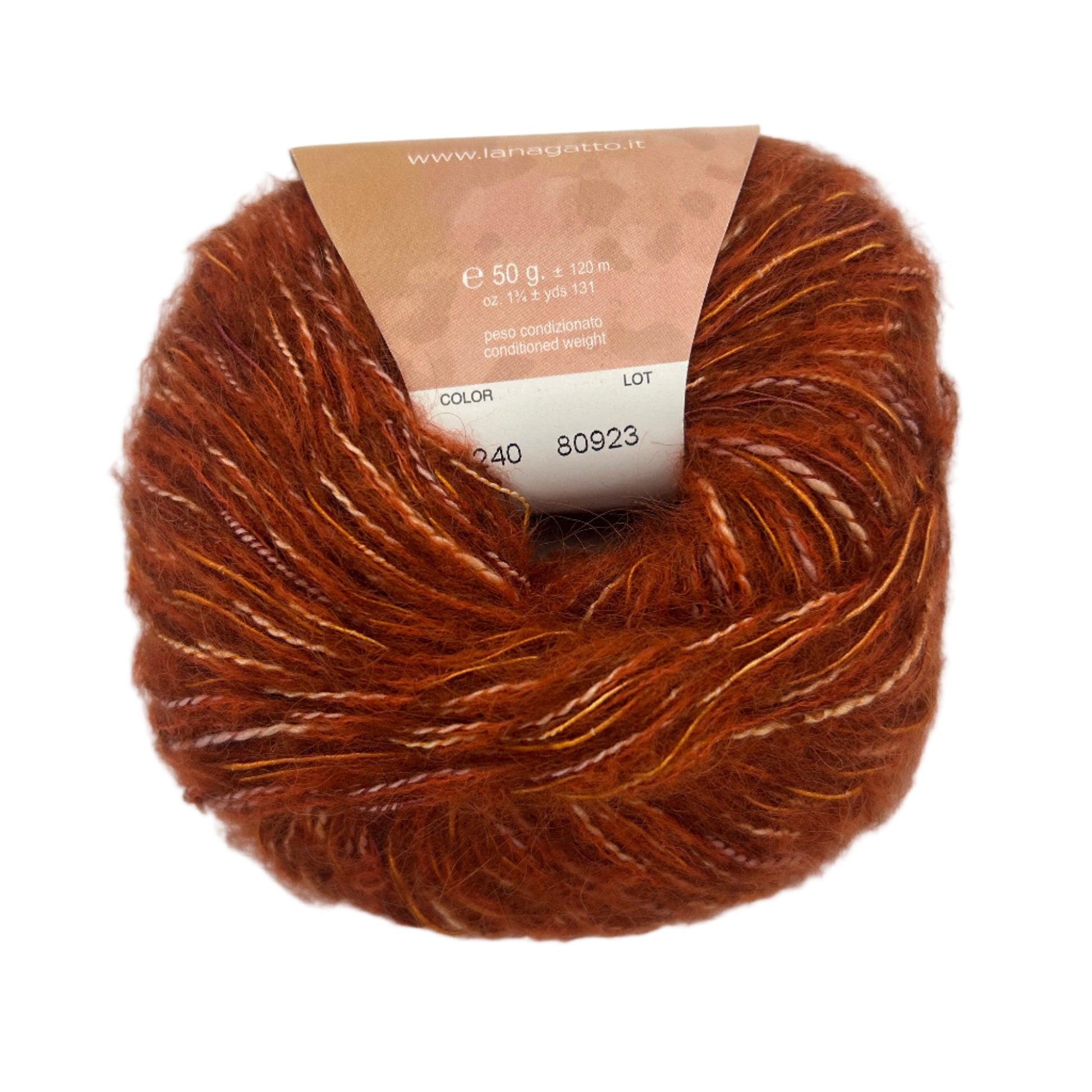 Brown yarn ball with a label on a white background