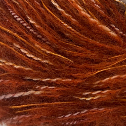 Close-up of brown yarn with subtle color variations
