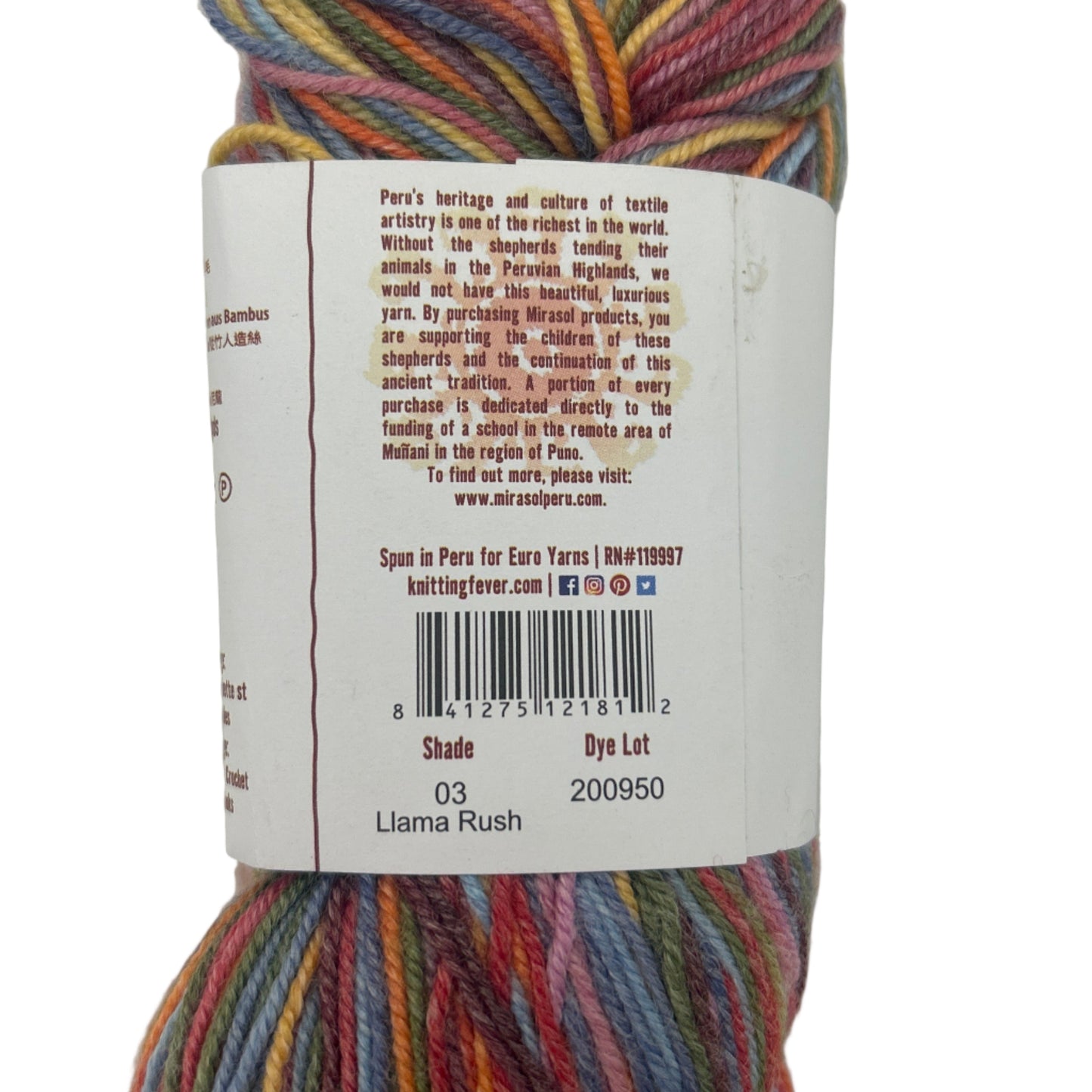 Multicolored skein of yarn with a label on a white background