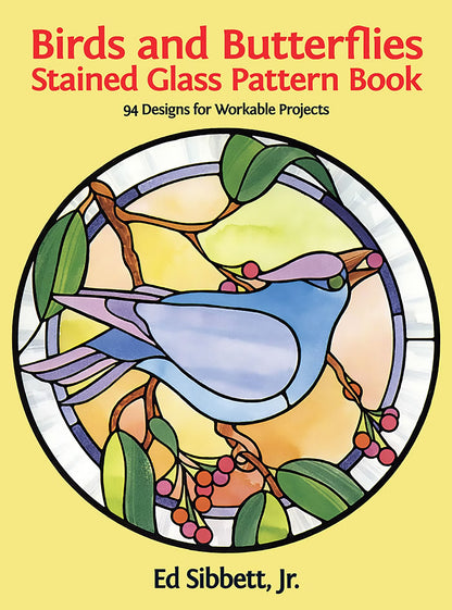 Book cover of 'Birds and Butterflies Stained Glass Pattern Book' with a stained glass design of a bird on a yellow background.