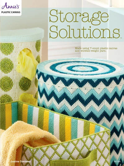Storage solutions made with Annie's Plastic Canvas featuring patterned containers.