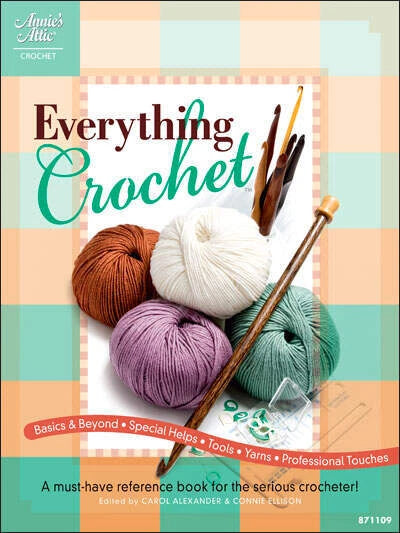 Book cover of 'Everything Crochet' with yarn and hooks on a checkered background
