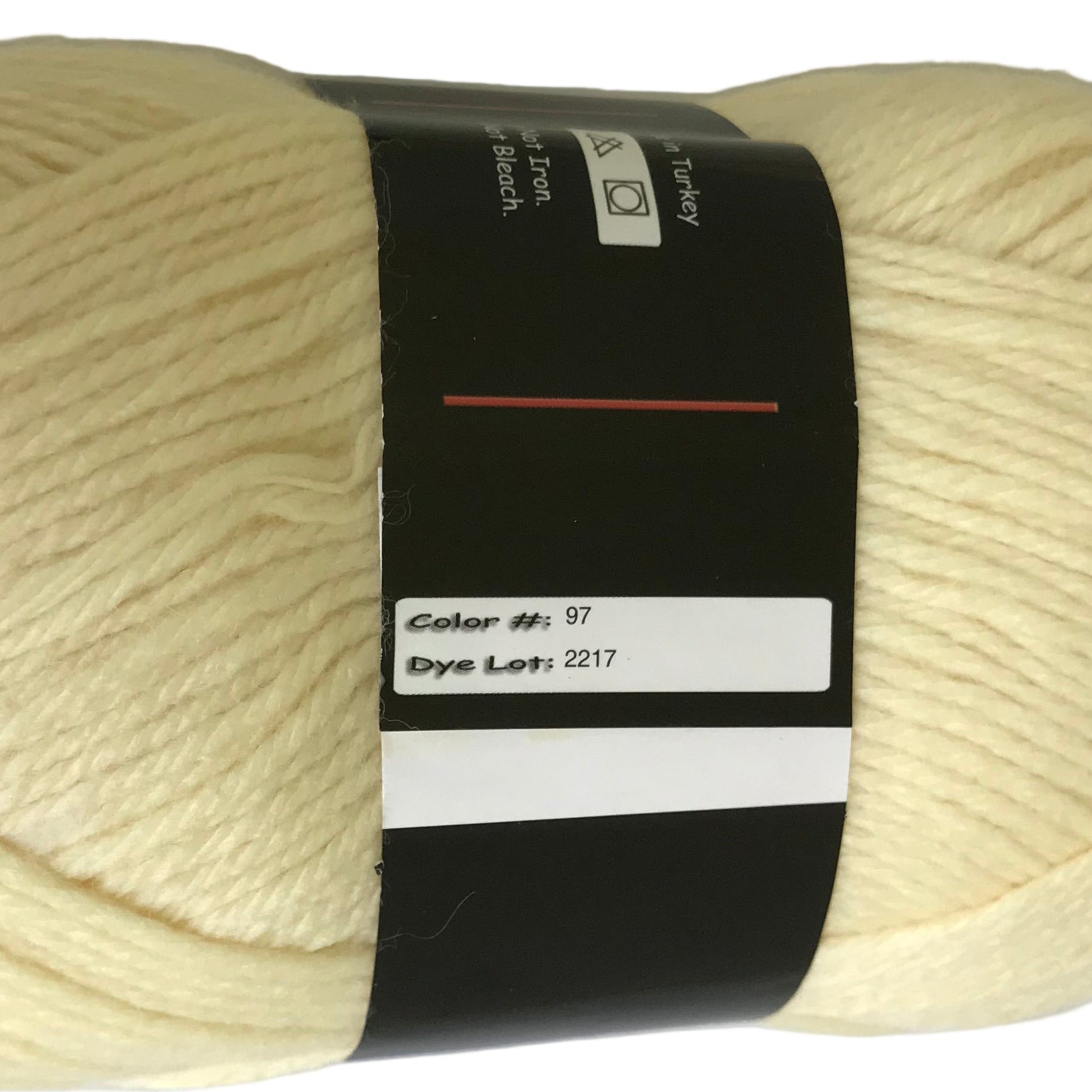 Ball of cream-colored yarn with a label on a white background