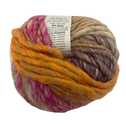 Multicolored skein of yarn with a label on a white background
