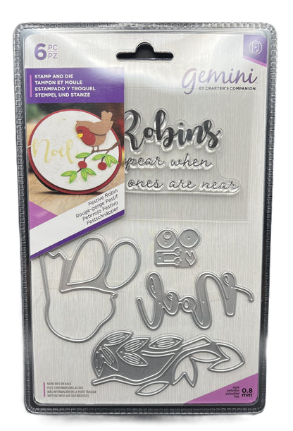 Packaged Gemini metal stamps with decorative text and illustrations on a white background