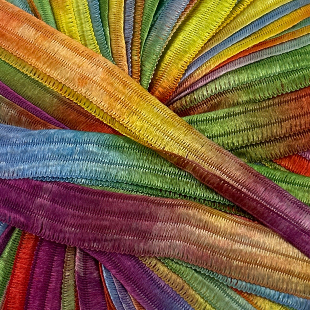 Close-up of colorful ribbons in a circular arrangement