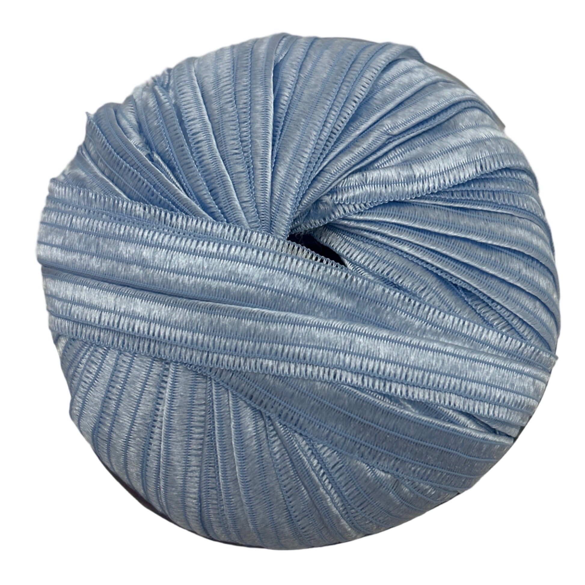 Blue skein of yarn on a beige surface
