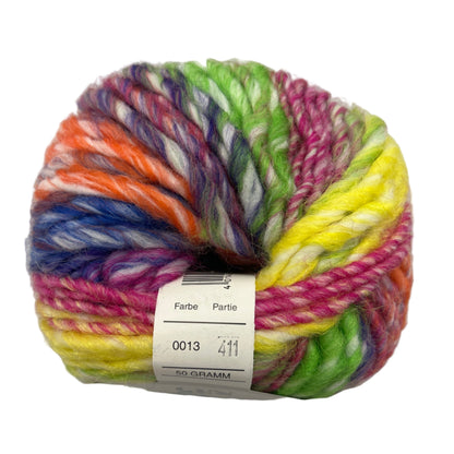 Multicolored skein of yarn with a label on a white background