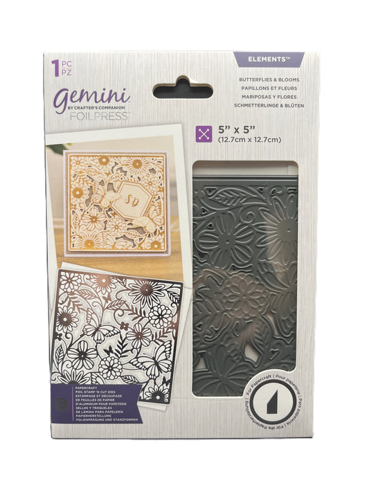 Packaging of Gemini foil press elements with floral designs on a white background