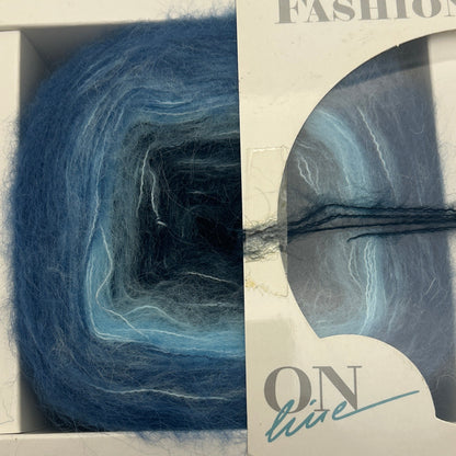 Blue yarn skein with a 'K&N' label on a white background