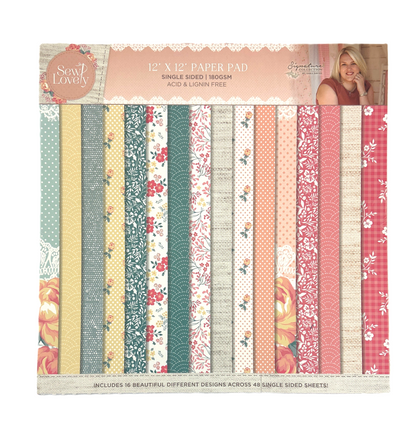 12x12 paper pad with various floral and patterned papers, featuring a woman's face in the corner.