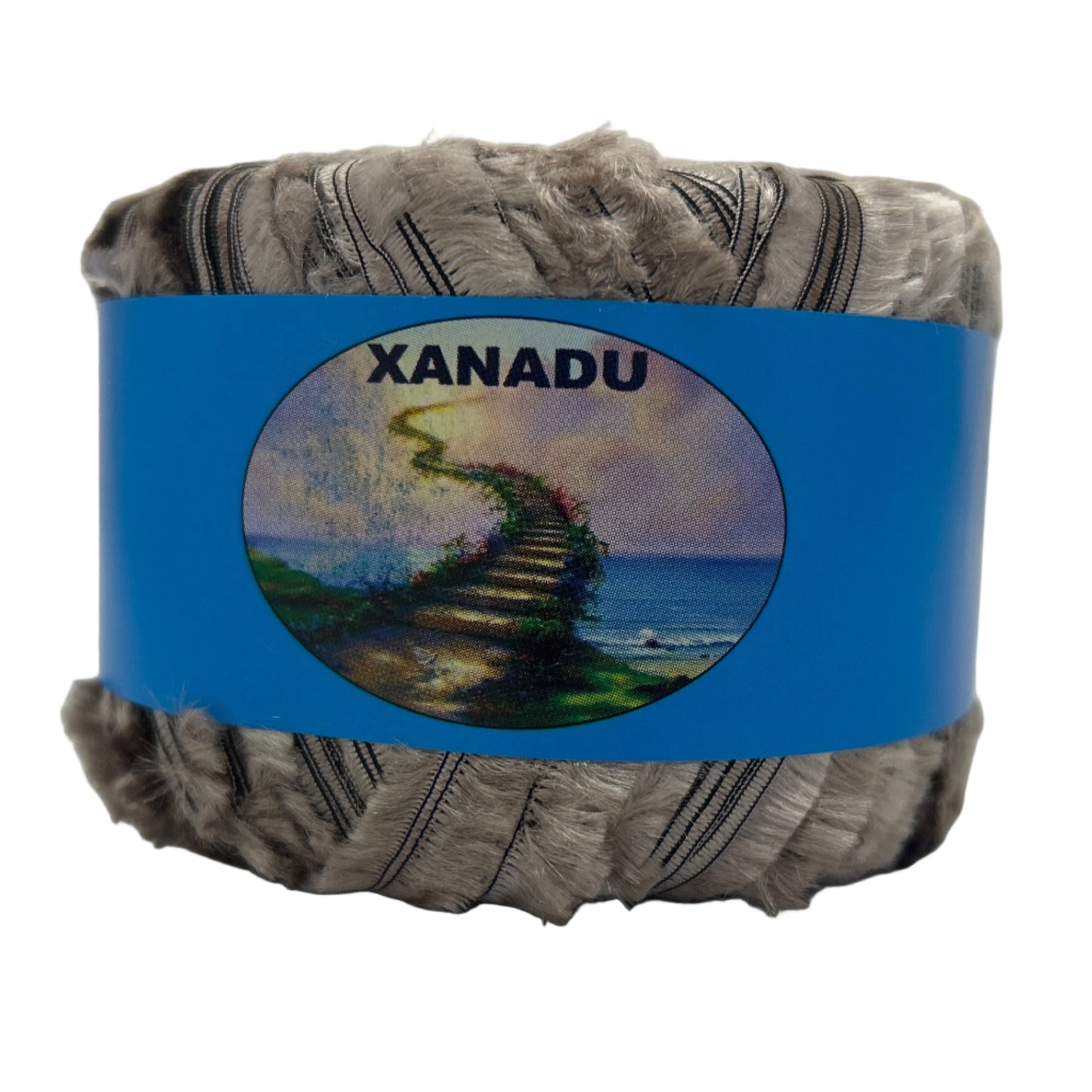 Yarn ball with 'Xanadu' label featuring a scenic design on a white background