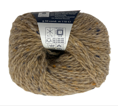 Ball of yarn with a label on a white background