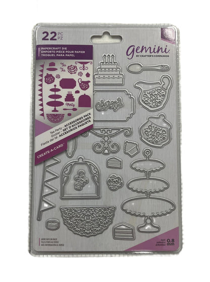 Packaged Gemini paper craft die set with various shapes and designs on a neutral background