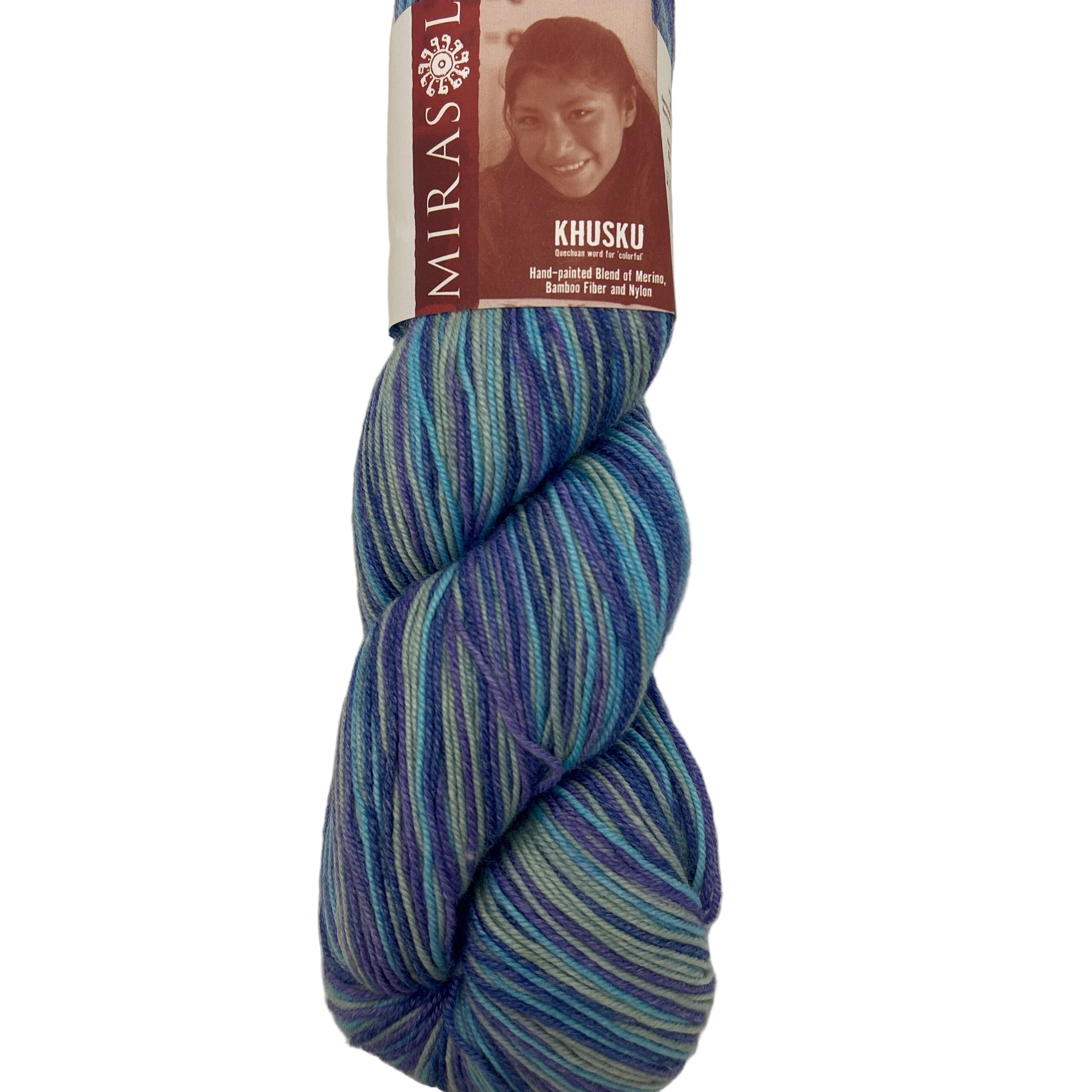 Blue striped yarn with Mirasol Khusky label on a tiled background