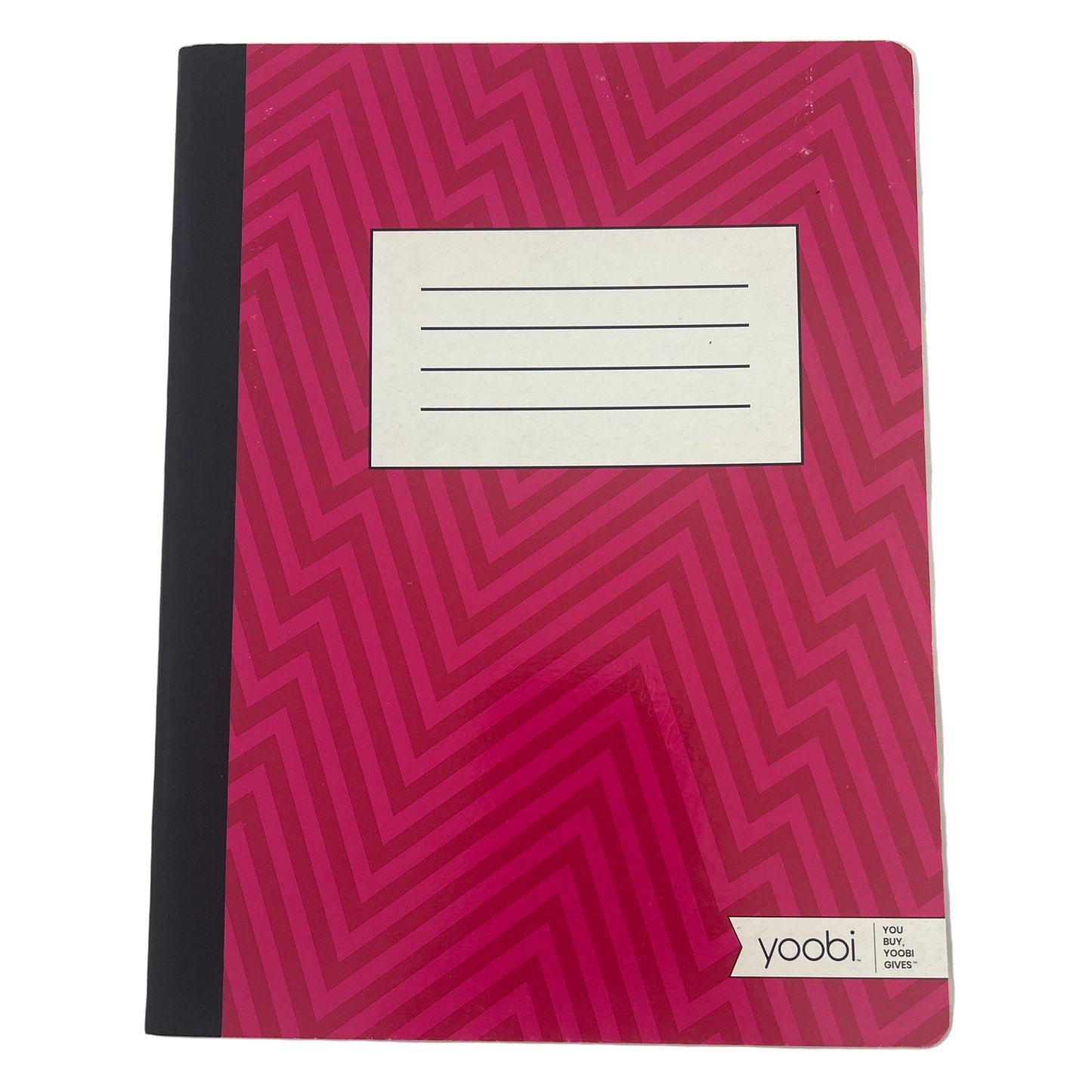 Pink notebook with black geometric pattern on a white background