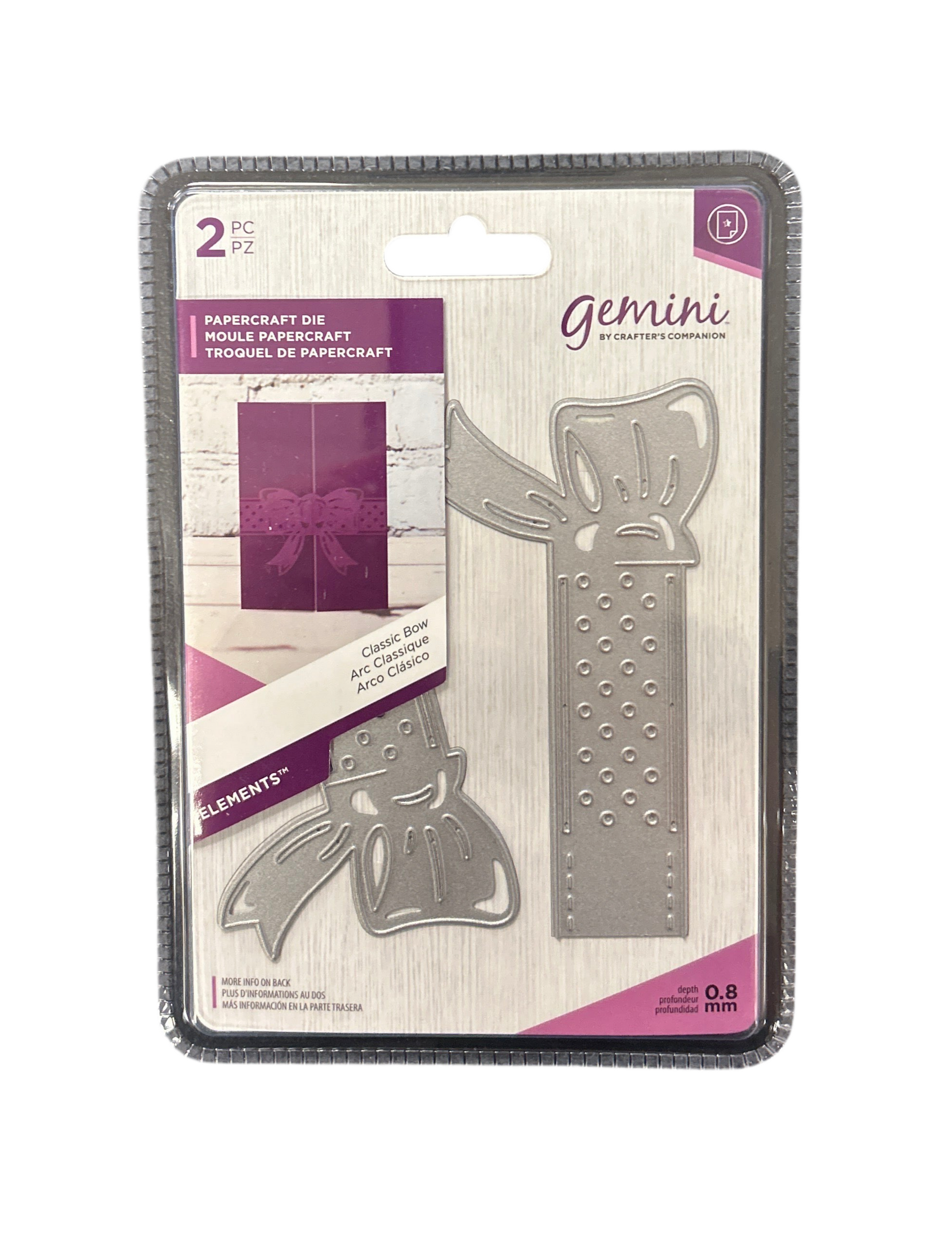 Metallic paper crafting dies with decorative elements on a Gemini packaging.