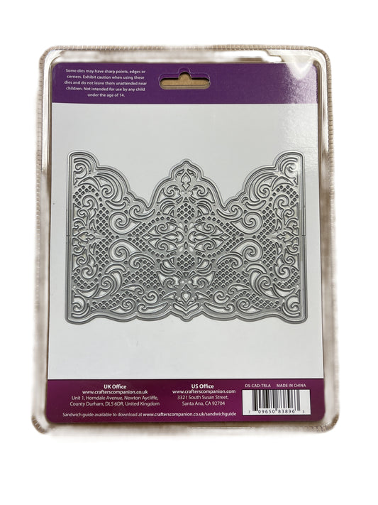Decorative metal cutting die on packaging with visible brand details
