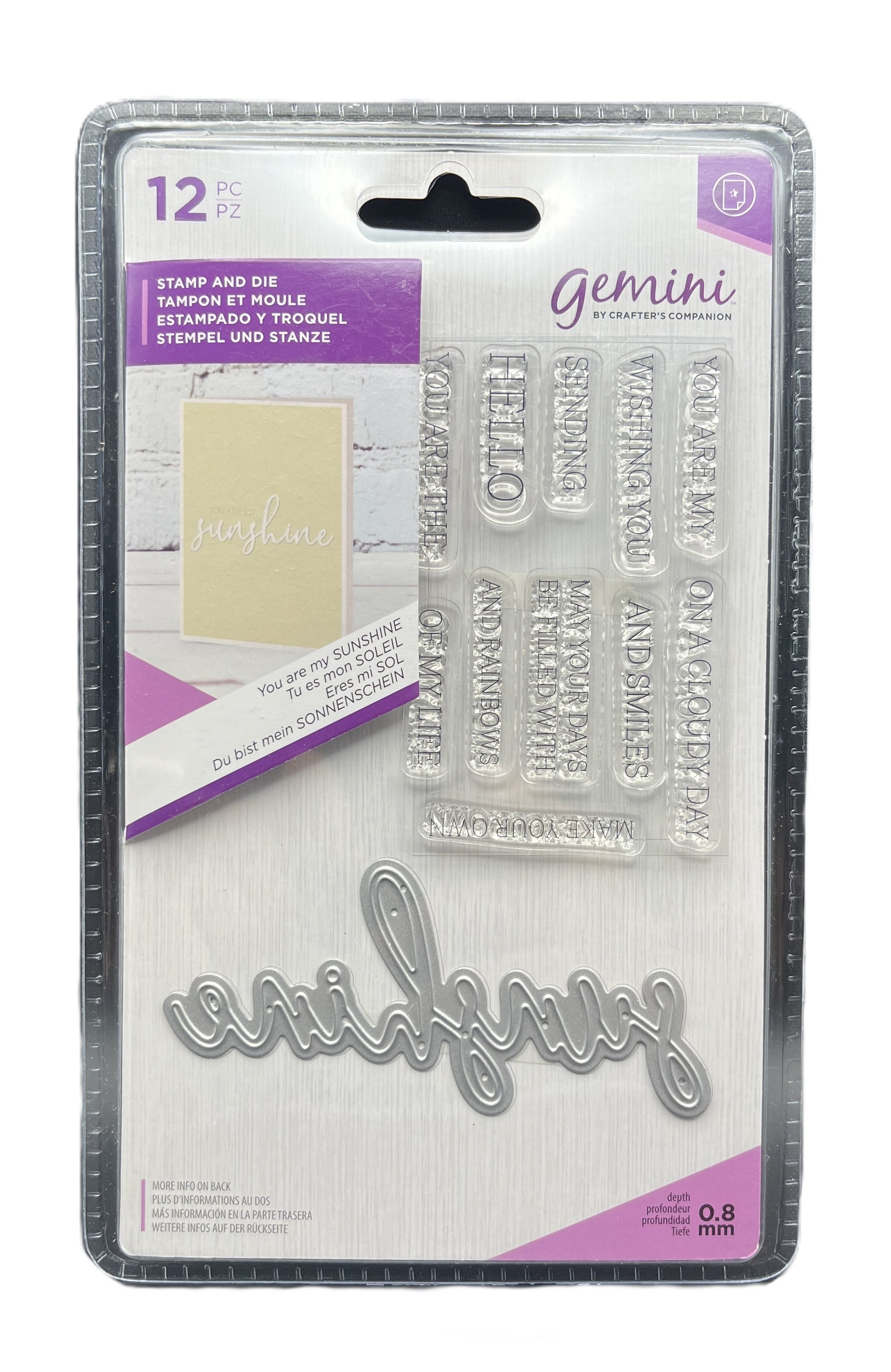 Packaging of Gemini stamps with clear stamps and a die-cut word on a white background