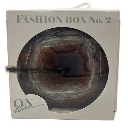 Fashion box with hair product on a white background